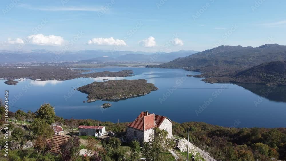 Aerial drone 4k video of blue lake and small islands Aerial drone 4k video of blue lake and small islands
