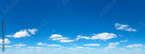 Blue Sky background with tiny Clouds. Panorama background