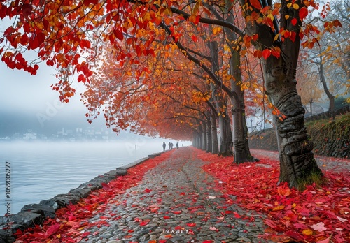 Autumnal Pathway Through Red Leaves on a Foggy Day