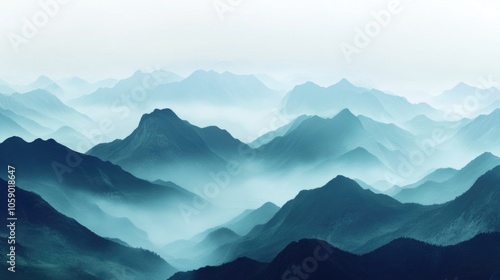 A dramatic view of misty mountains with a clear sky above.