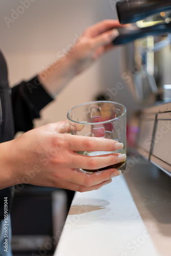 person holding a cup of coffee