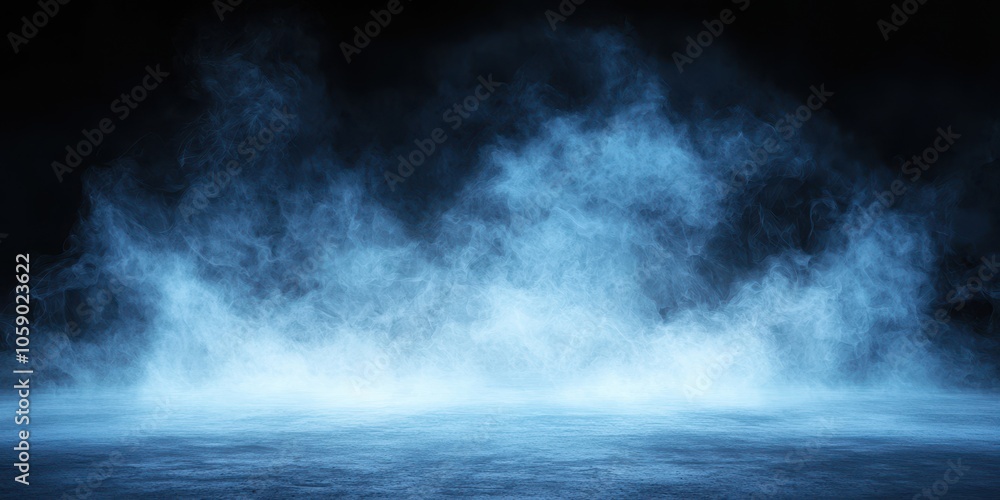 Fototapeta premium Blue mist and smoke swirling against a dark background, creating an atmospheric and mysterious effect.