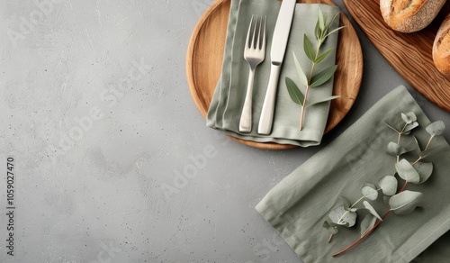 Wooden Plate With Cutlery and Greenery
