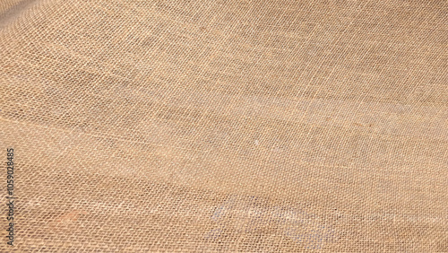 Cloth fabric texture wallpaper background. Jute pattern, rough burlap texture, canvas coarse cloth, brown woven rustic bagging.