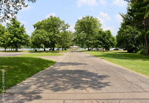 Fototapeta Naklejka Na Ścianę i Meble -  The long road in the countryside on a sunny day.