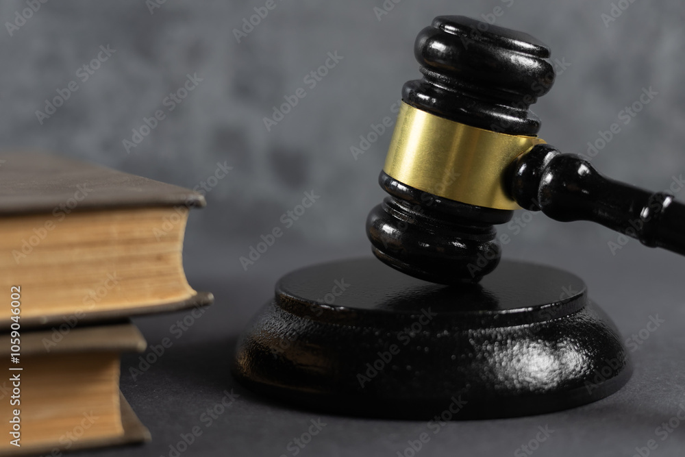 Lawyer or judge's hammer in court The auction hammer is on the woo table. Lawyer or judge's hammer in court The auction hammer is on the woo table.