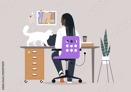 In a tranquil afternoon setting, a person attentively works on a laptop while a curious cat playfully investigates the desk, surrounded by lively decor and a peaceful atmosphere