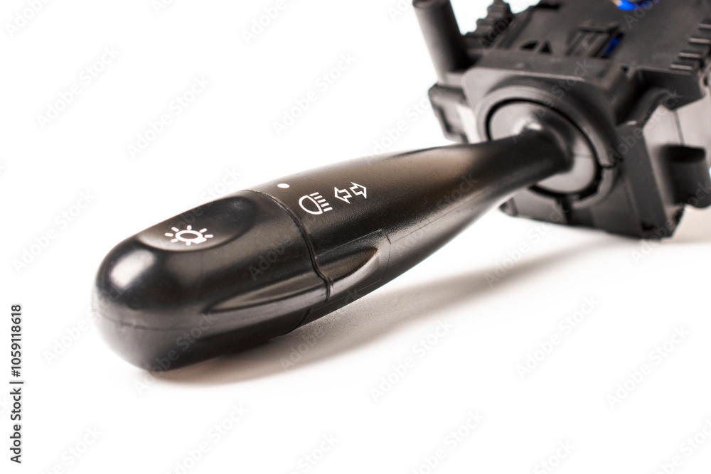 Close-up. Switches the direction indicator switch lever, also turns on the lighting, selective focus. Road safety Close-up. Switches the direction indicator switch lever, also turns on the lighting, selective focus. Road safety