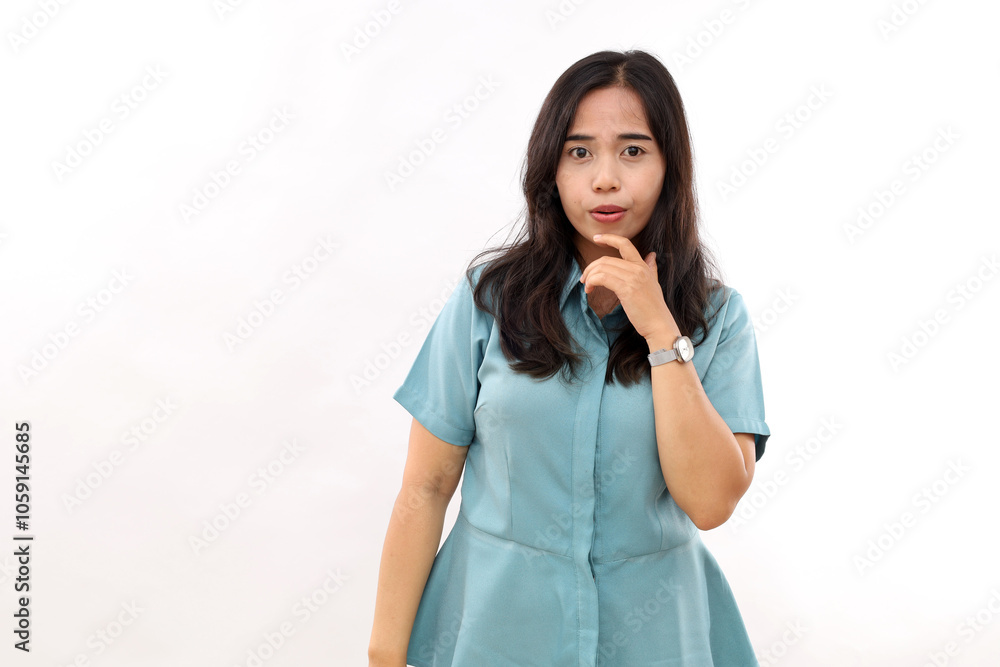 Confused shocked Asian woman reacts on something with wondered frightened expression wears casual shirt looks startled stares at promo logo isolated over white wall Confused shocked Asian woman reacts on something with wondered frightened expression wears casual shirt looks startled stares at promo logo isolated over white wall