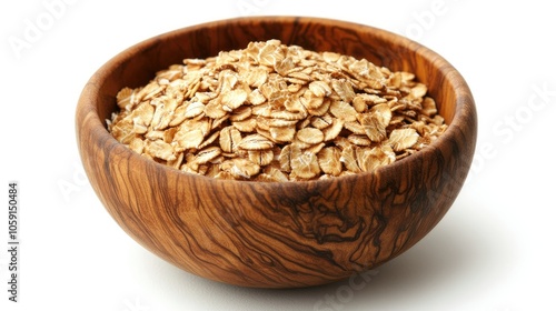 Rolled oats in a wooden bowl on a clean white background, creating a rustic and nutritious atmosphere
