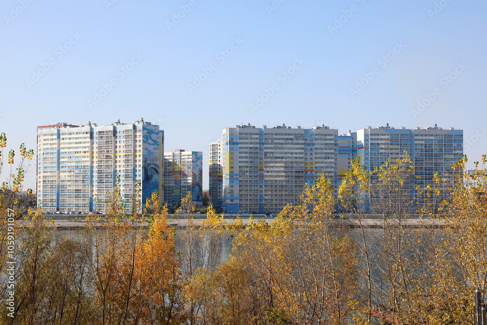 Fototapeta premium Autumn landscape with multi-storey buildings in the Siberian city of Novosibirsk