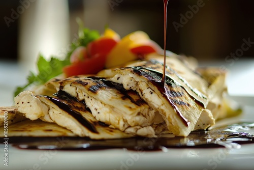 Balsamic dressed chicken quesadilla with three cheeses Shallow focus photo