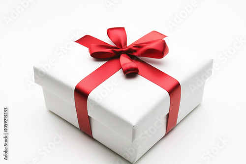 Wrapped gift box with red ribbon on a white background