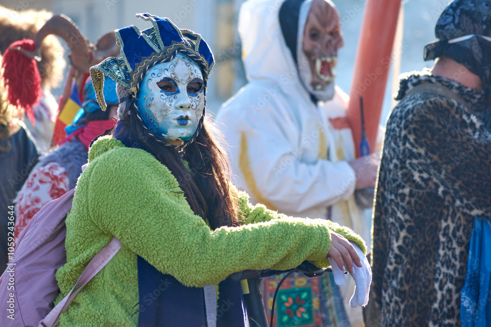 Comănești, Romania, December 2023: Local man dressed in bear fur, Romanian traditions, participates in the bear dance in the Comănești Traditions Festival