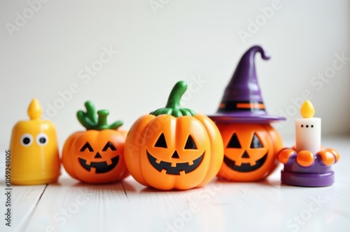 Halloween holiday toy pumpkins, toy caps, toy graves, toy candles, photo