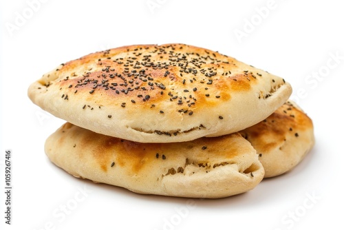 Isolated tiny Lebanese Arabic bread on a white backdrop photo