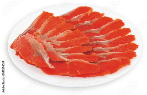 sliced red fish on a plate: pink salmon, amberjack, chum salmon, salmon, trout, tuna, haddock, herring, mackerel, steelhead salmon, chinook Salmon, Coho Salmon, Sockeye Salmon, Cutthroat trout, Rainbo photo