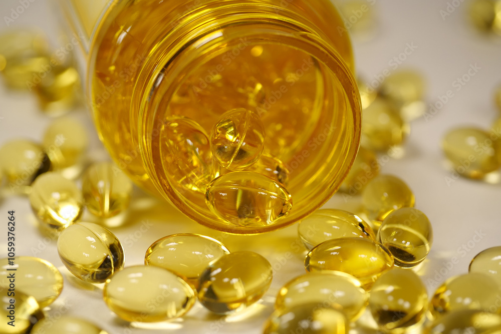 Yellow gelcaps with fish oil, or vitamin D3, and yellow container Yellow gelcaps with fish oil, or vitamin D3, and yellow container