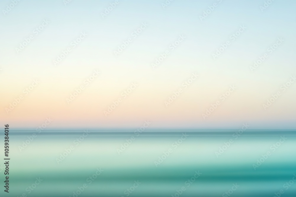Obraz premium Blurred sunset over sea, gradient of warm to cool hues
