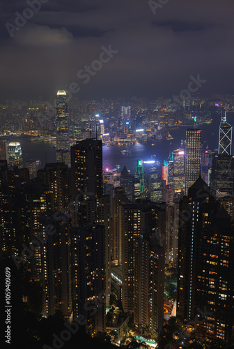 Hongkong China 11.7.2023. Hongkong bay night cityscape skyline