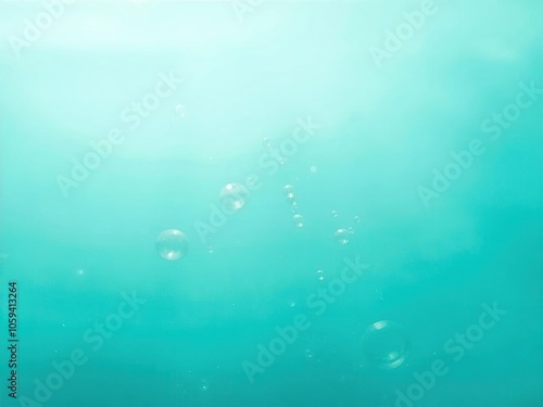 Abstract image of bubbles floating gracefully in turquoise sea water, creating a tranquil and mesmerizing underwater scene, clear, tranquil photo