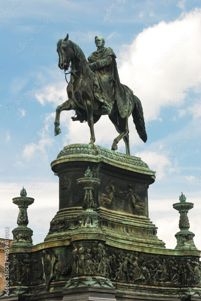 Fototapeta premium Famous monument, memorial of Johann, King of Saxony sitting on horseback on the theatre square of the ballet in Dresden in the country Germany.