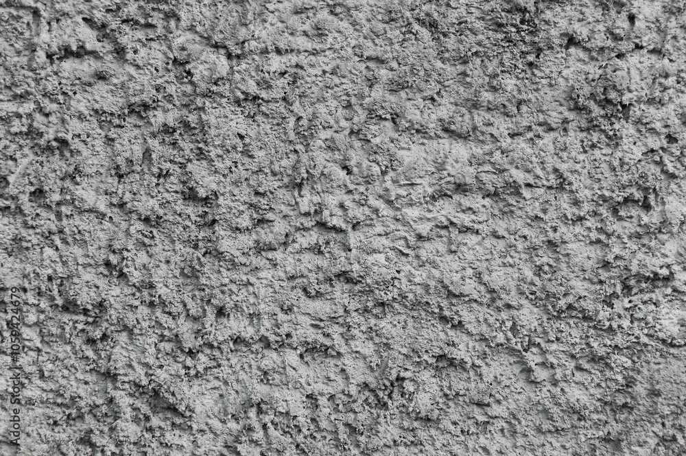 Background, texture of a gray uneven rough wall made of stone, cement. Background, texture of a gray uneven rough wall made of stone, cement.