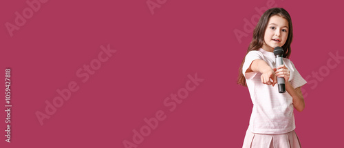Cute little girl singing ag...