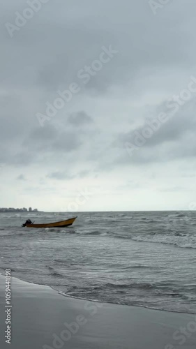 boat on waves at the ocean