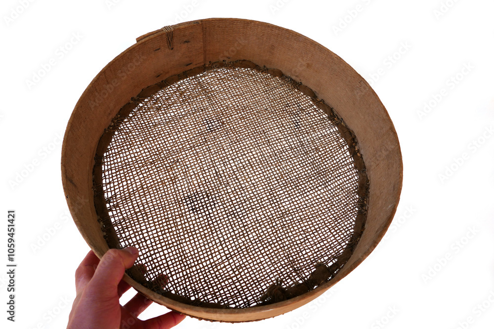 A fine-mesh sieve made of leather, used in Turkey in the past to sift grain.