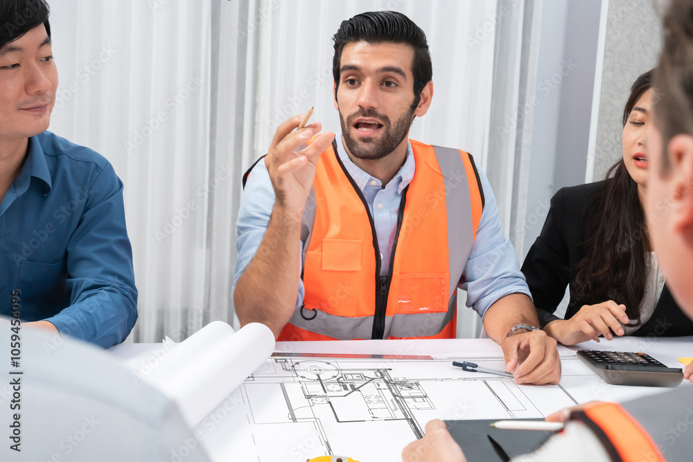 Diverse group of civil engineer and client working together on architectural project, reviewing construction plan and building blueprint at meeting table. Prudent Diverse group of civil engineer and client working together on architectural project, reviewing construction plan and building blueprint at meeting table. Prudent