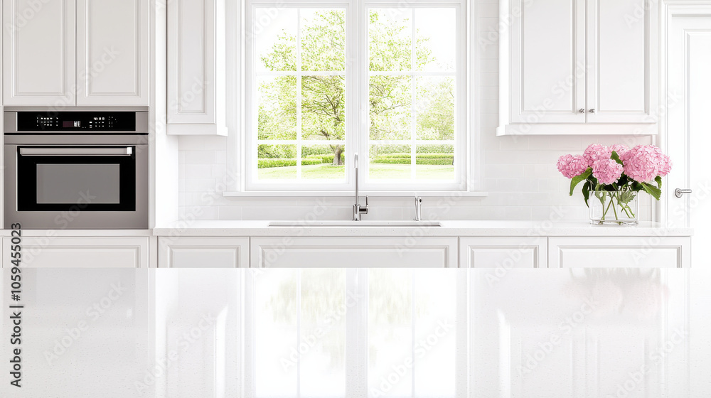 Fototapeta premium Modern kitchen with marble countertops and view of nature outside. bright space features elegant