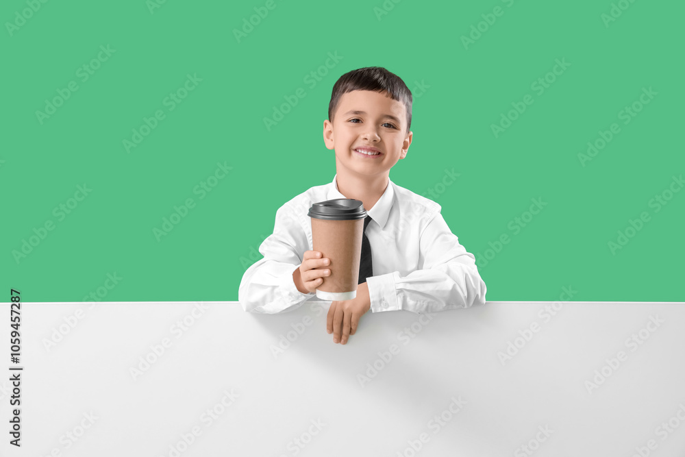 Cute little barista with coffee cup and blank poster on green background. Opposite Day celebration Cute little barista with coffee cup and blank poster on green background. Opposite Day celebration