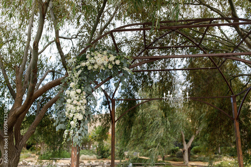 Wedding arch with flowers photo