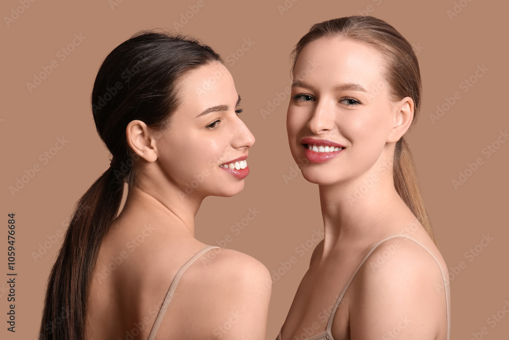 Beautiful sisters on brown background Beautiful sisters on brown background