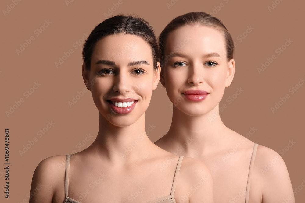 Smiling young sisters on brown background Smiling young sisters on brown background