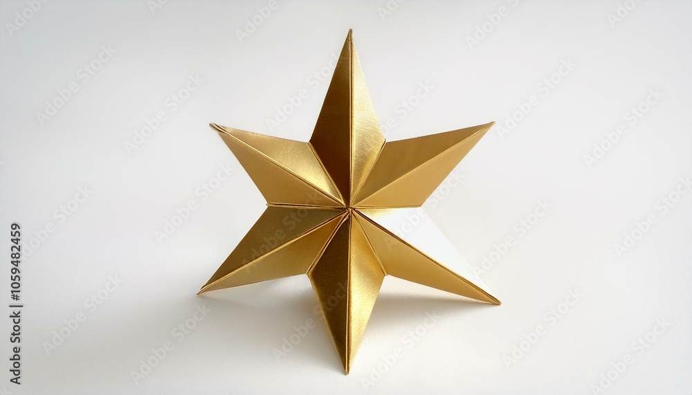 Gold origami star on white Gold origami star on white