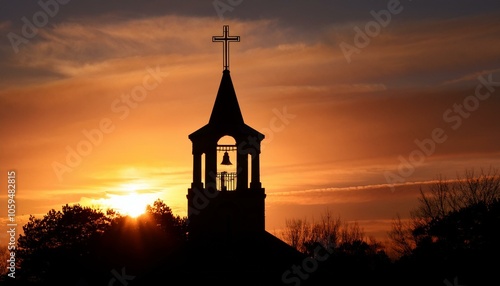 Church bell tower at sunset