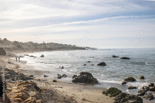 View from  a rocky  beach onto a rocky bay of the Pacific ocean, daytime, nobody 