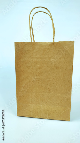 Isolated paper bag indicating buy of natural products with sustainable and pratices on the white background.
 photo