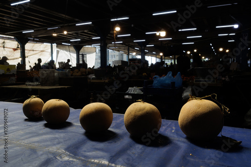 melon on a counter at the market photo