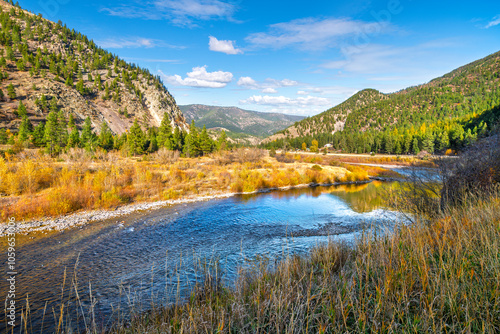 Fototapeta Naklejka Na Ścianę i Meble -  The Clark Fork River as it runs through the mountains of Western Montana near Missoula, Montana at autumn.