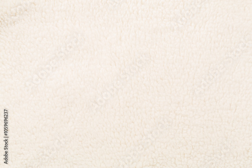Canvas Print White cuddle teddy bear fabric as background, top view