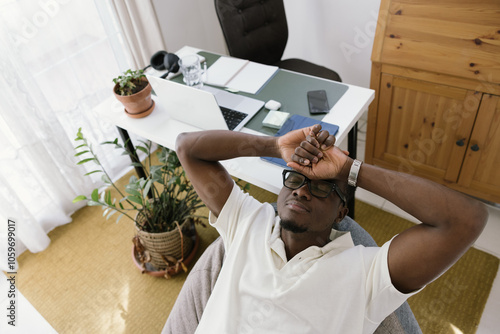 A man relaxing on a soft bag photo