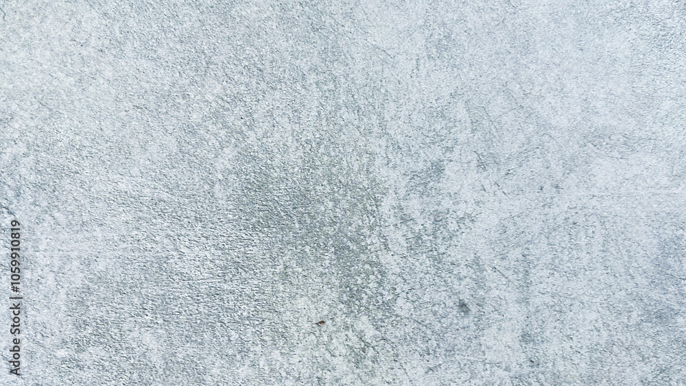 Fototapeta premium Close-up view of a textured grey wall surface. Classic, elegant and charming textured background photo for banner background.