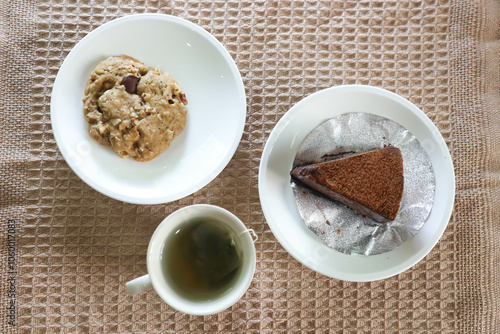 hot tea , cookie and cake on the table or tea time photo