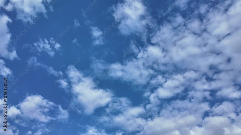 Timelapse of cumulus clouds moving fast across the summer sky Timelapse of cumulus clouds moving fast across the summer sky
