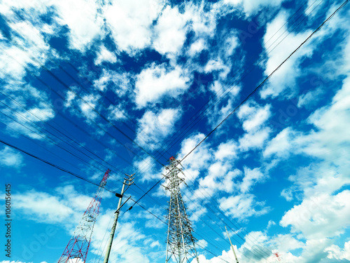 送電線と電柱と青空 photo