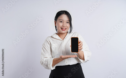 Young, obese, plus-sized Asian office worker wearing white shirt posing on plain white background