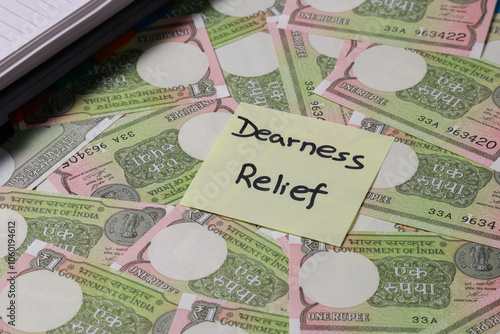 Dearness Relief message on One rupee notes. paper note of One Rupee. One rupee paper note background. Indian Currency. Indian Currency Note. Dearness relief DR changes frequently photo